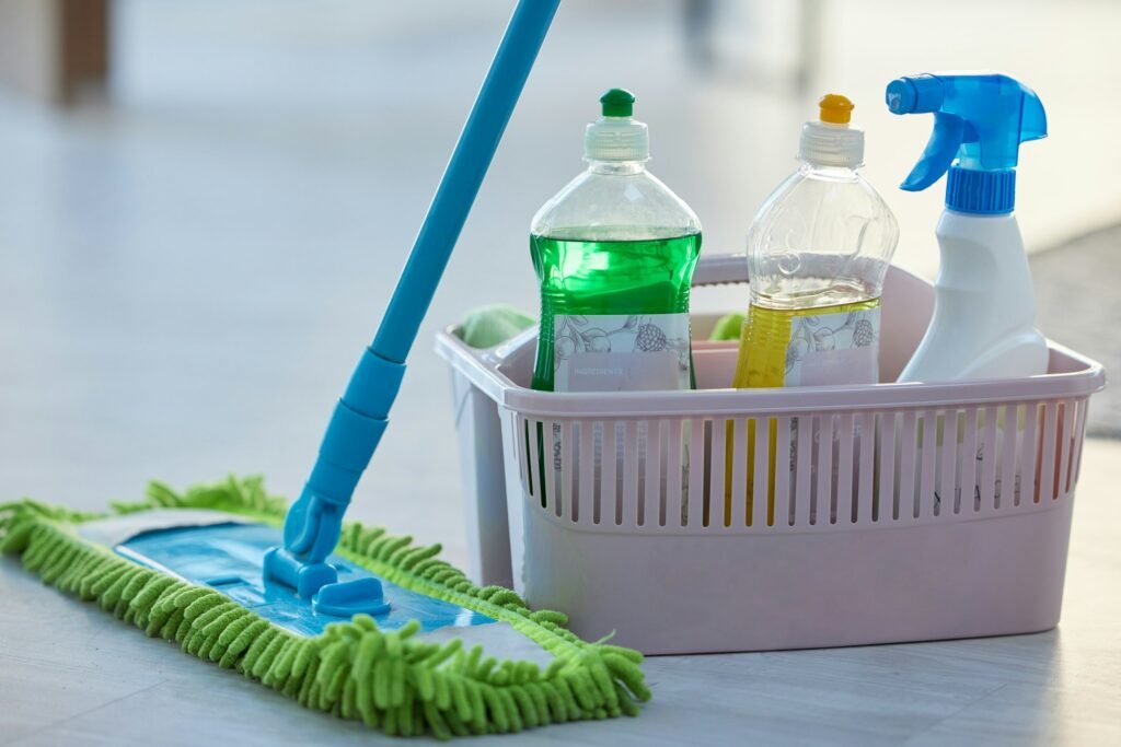 Cleaning, product and basket with mop, bottle and spray for cleaning services, wellness or chemical